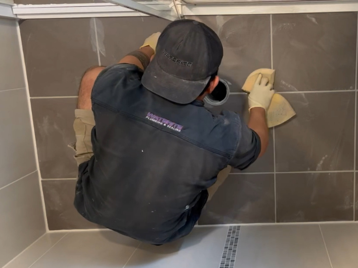 epoxy grout vs traditional grout in leaking shower and bathroom sealing repair